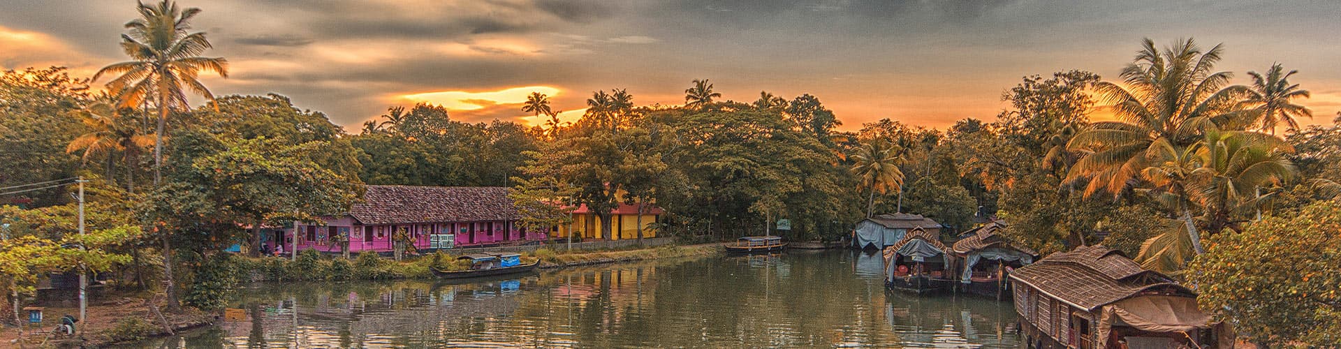 HHPWC - Sunset views of the Kerala Backwaters surrounded by palm trees