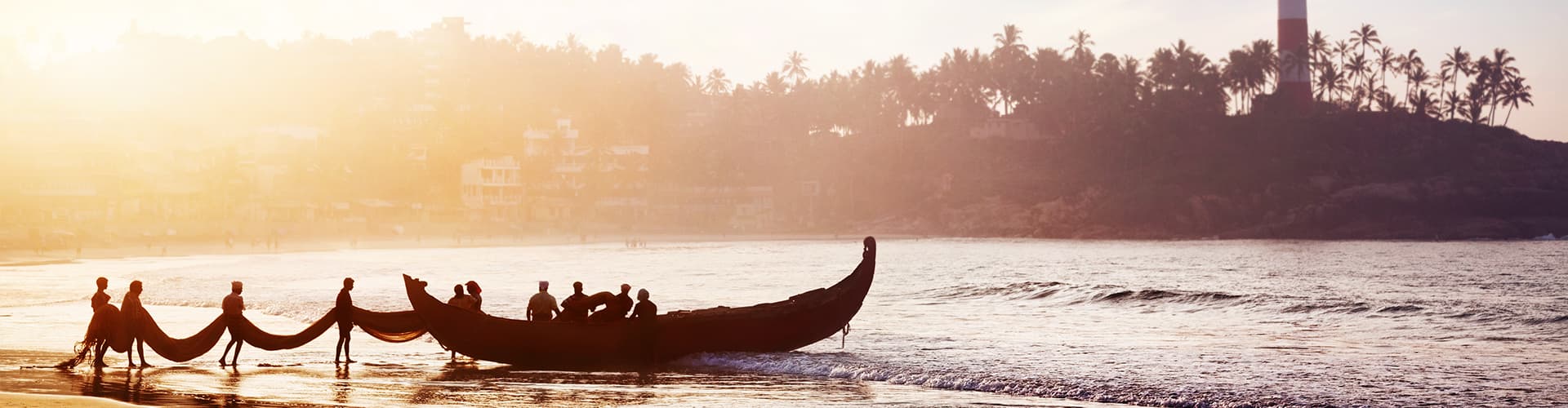 india kerala boats beach sunset silhouettes