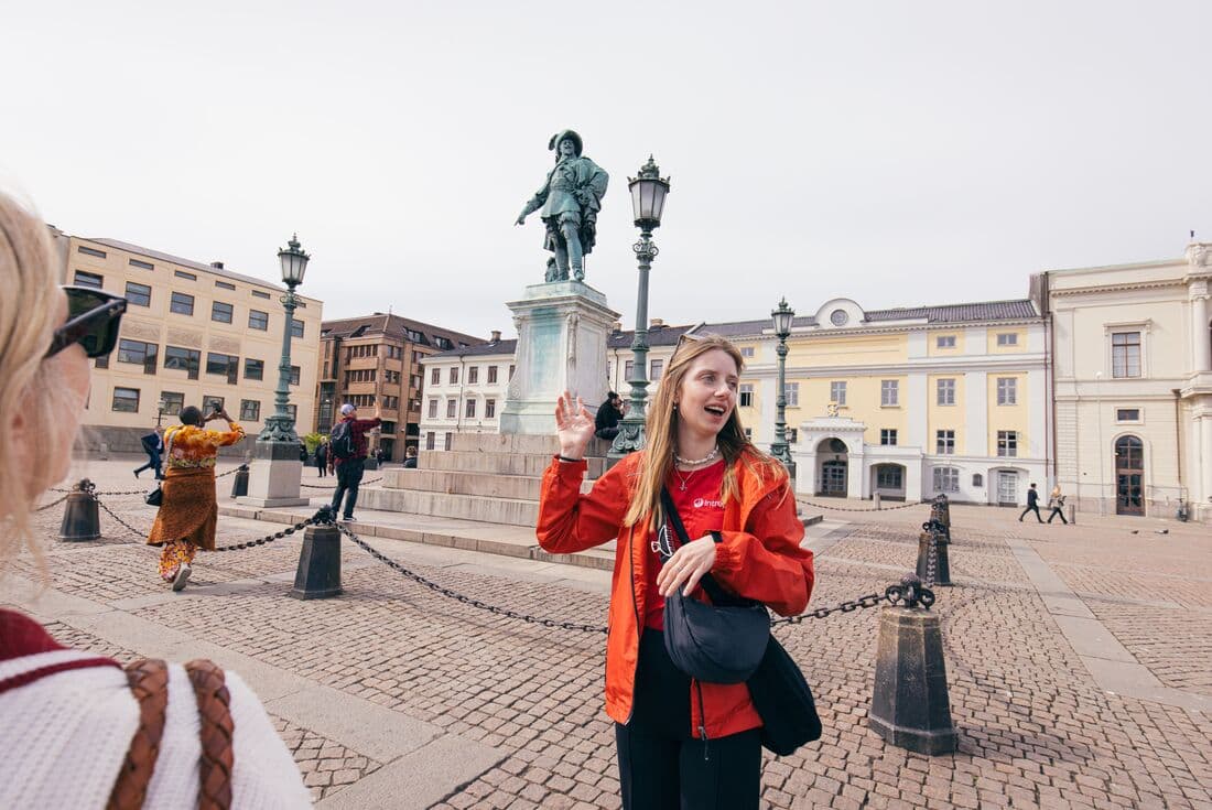 A talk in Gustaf Adolf's square in Gothenburg's old town in Sweden