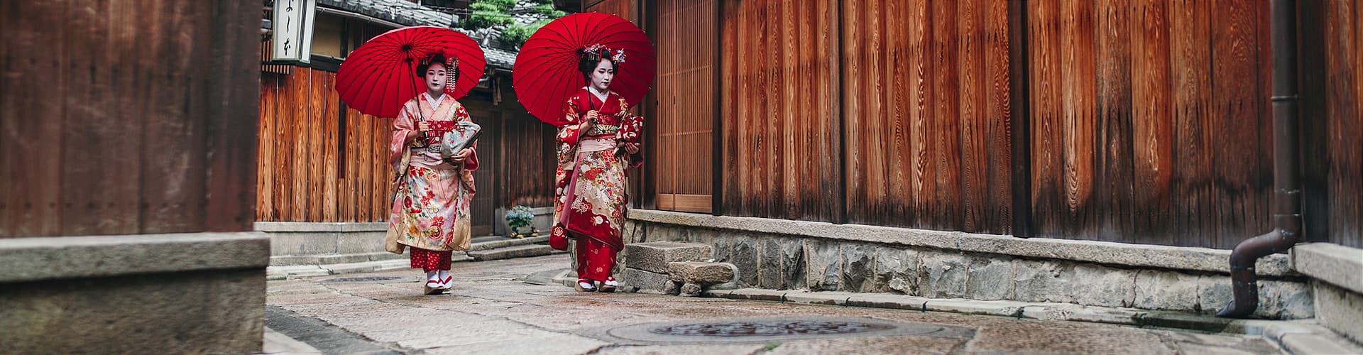 japan two geishas umbrellas