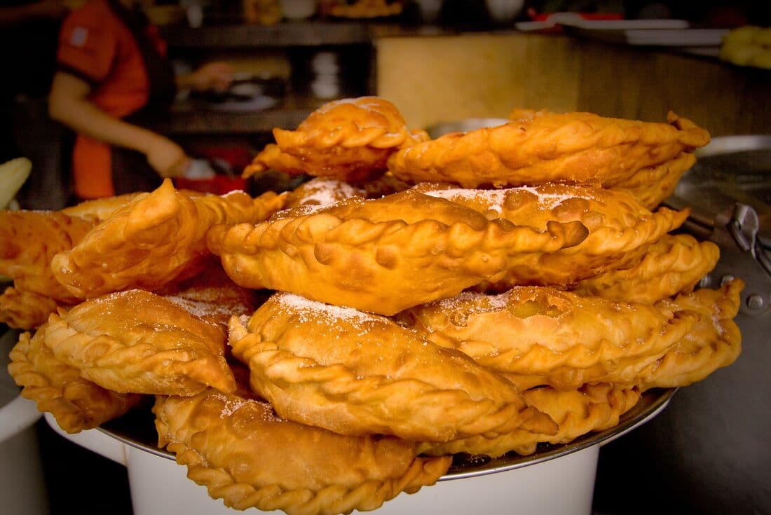 Close up of stacked empanadas freshly cooked in Ecuador