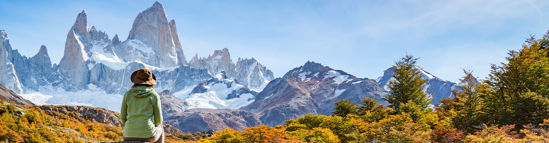 Traveller enjoying the view of Fitz Roy in the distance, Patagonia, El Chalten, Argentina