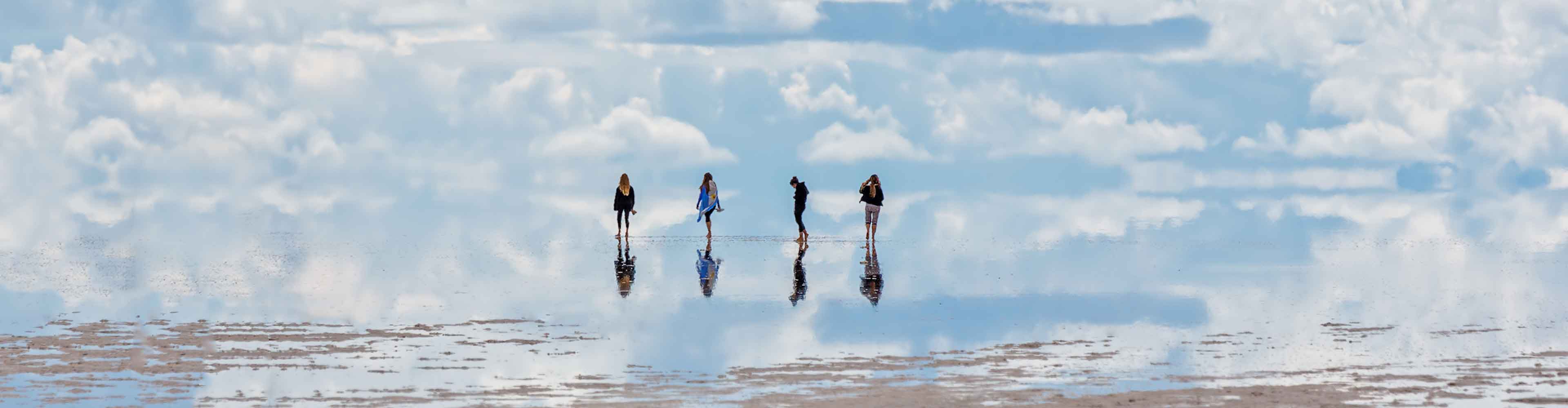 Four travellers explore the salt flats of Bolivia
