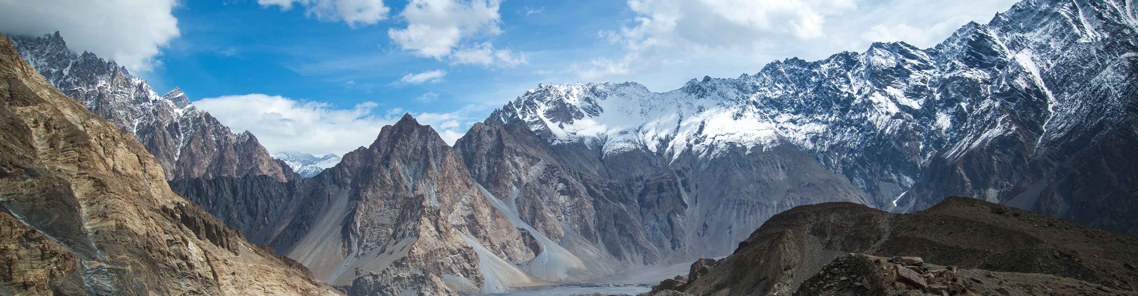 Rocky snow capped mountain range in the Hunza Valley