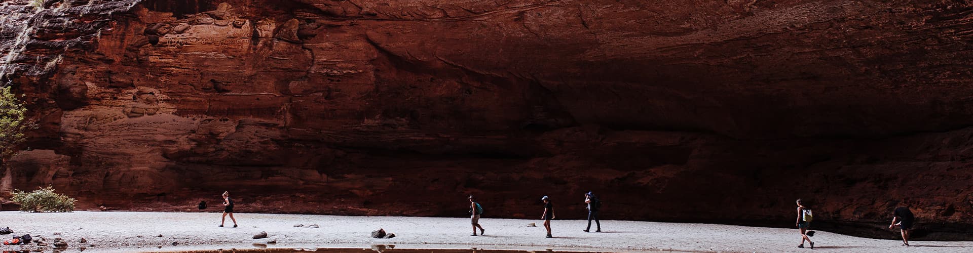 Travellers through Cathedral gorge in Purnululu NP, Western Australia