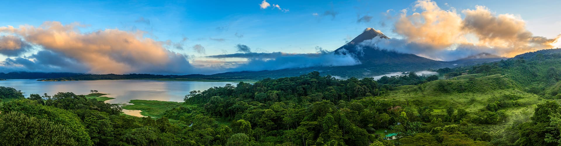Panoramic view of Arenal Volcano and lake in central Costa Rica