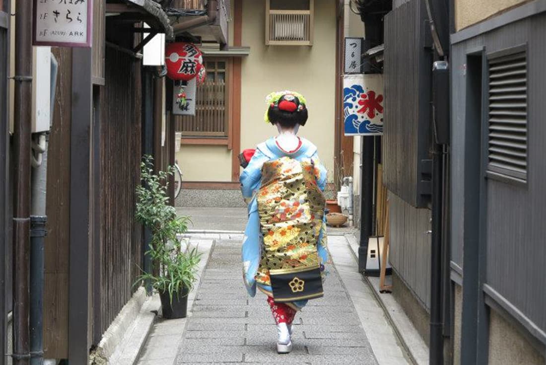 A geisha in a street in Kyoto