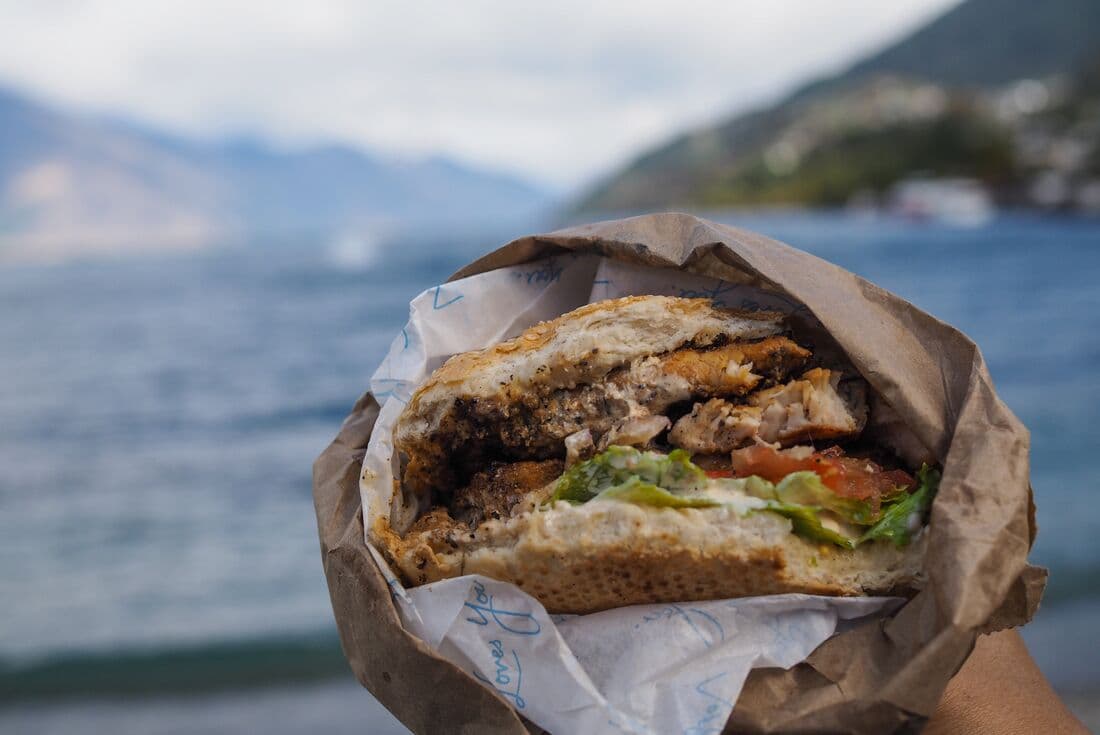 Close up of a burger from the famous Fergburger in Otago, Queenstown, New Zealand