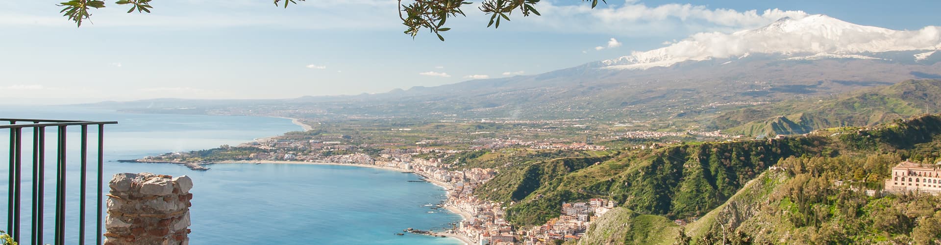 Mount Etna seen from a viewpoint of the roman theater in Taormina, Sicily