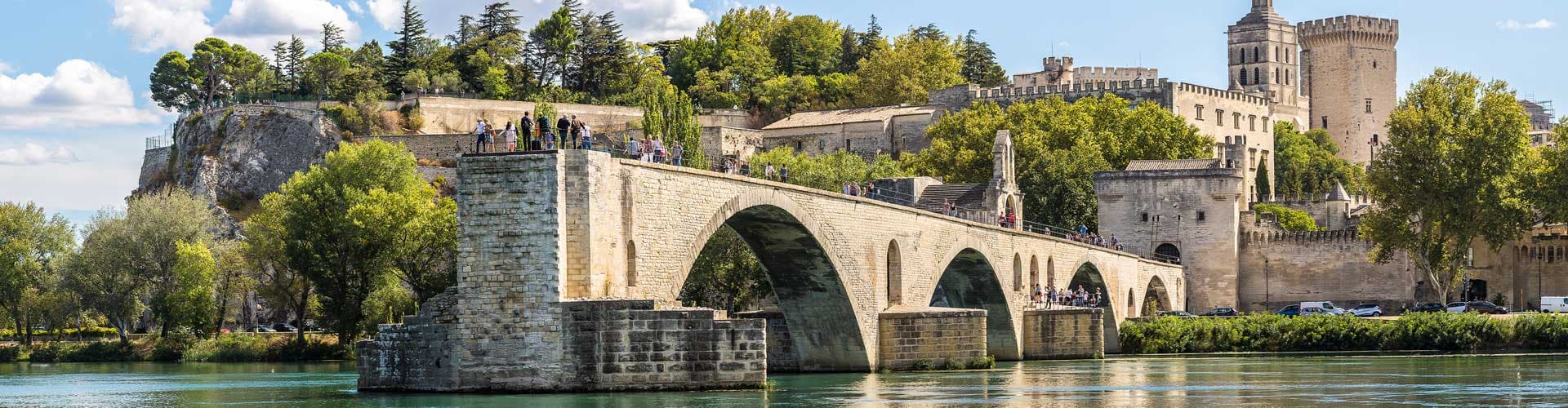 Saint benezet bridge meets canal in Avignon France