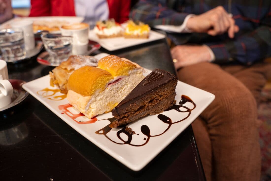 Cake and sweets on a plate at a cafe in Vienna, Austria