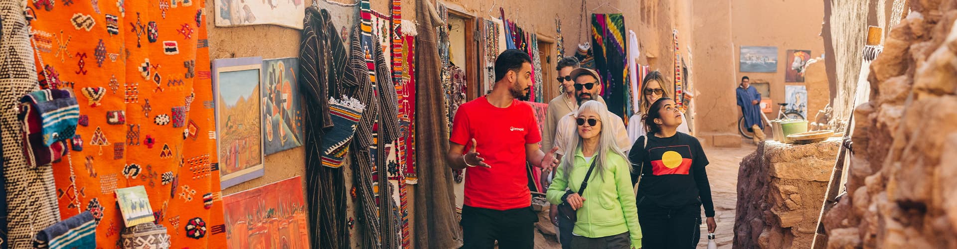 Travellers in the streets of Air Benhaddou, Morocco
