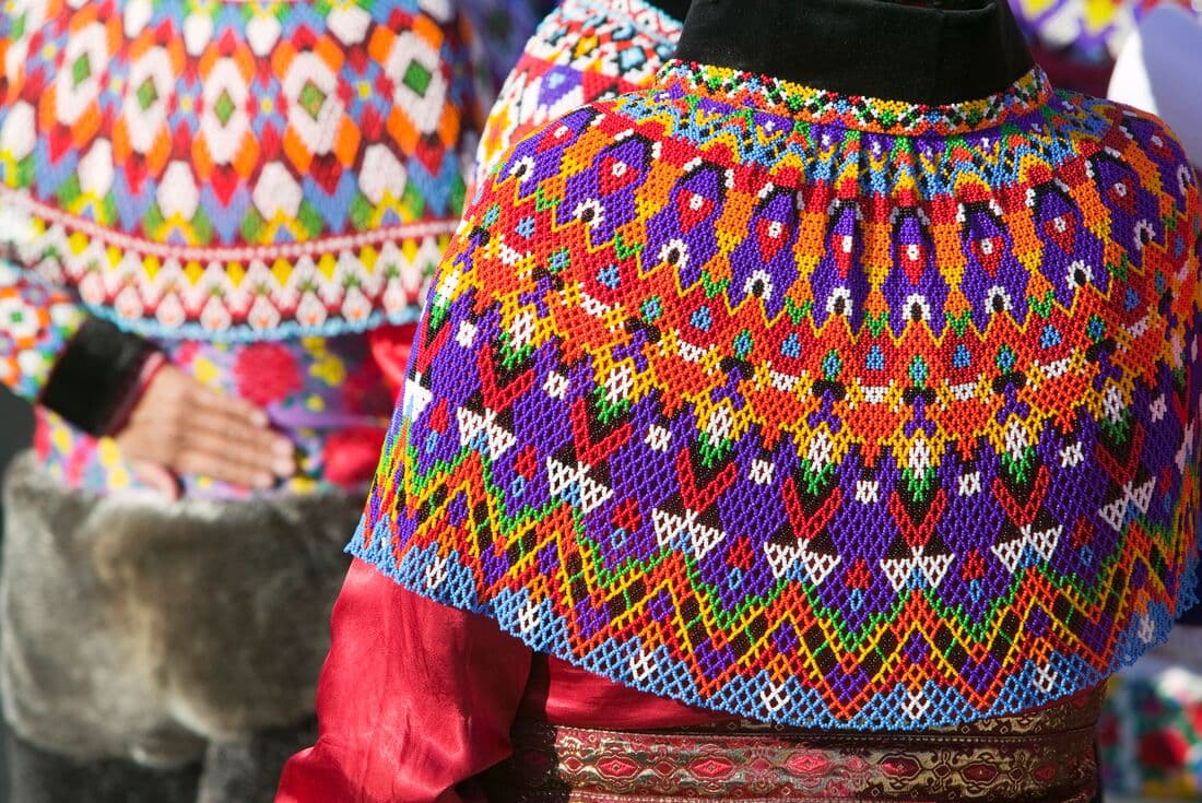 Elaborately patterned colourful clothing Inuit women of Greenland
