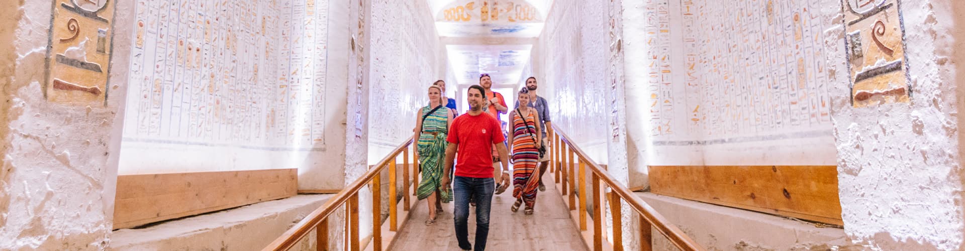 Travellers walking through the temples in Luxor, Egypt