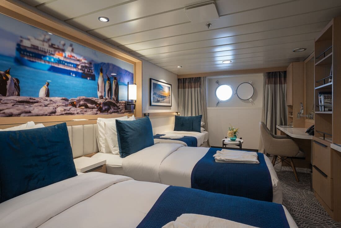 A triple stateroom on board the Ocean Albatros